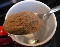 Cocoa mix on a spoon.