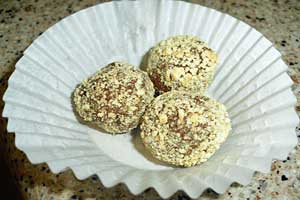 Chocolate balls covered in crushed graham crackers.