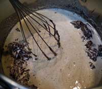 chocolate melting in hot heavy cream
