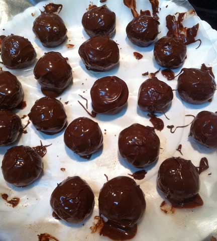 A completed batch of chocolate peanut butter balls.