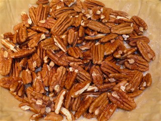 Pecans in raw pie shell.