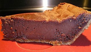 Slice of chocolate cheesecake.