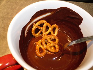 How do you make chocolate-covered pretzels?