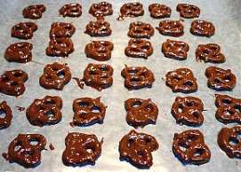 Tray of homemade dark chocolate covered pretzels.