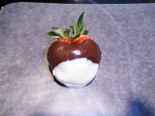Tuxedo chocolate covered strawberry.