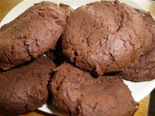 Dark chocolate cookies on a plate.