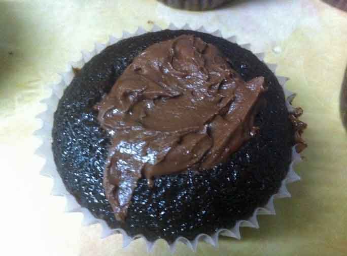 Fudge cupcake with milk chocolate cream cheese filling.