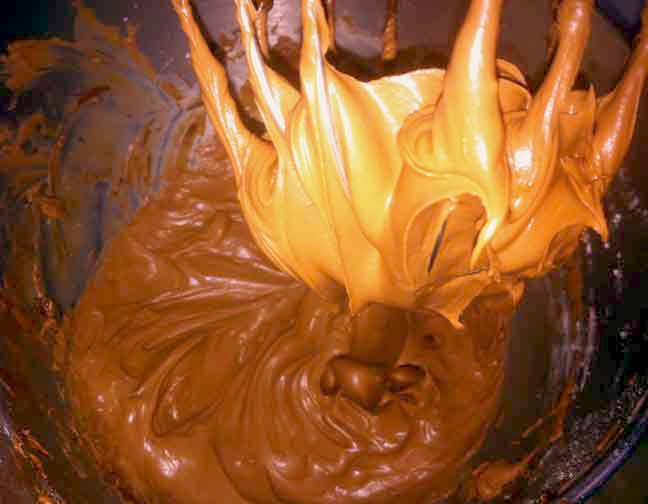 Mixing bowl filled with milk chocolate cream cheese filling from the death by chocolate recipe.