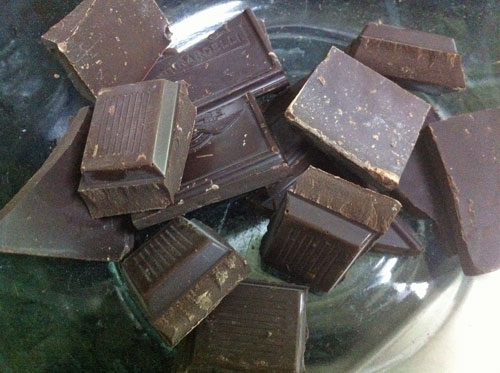 Chocolate squares ready to be melted in the microwave.