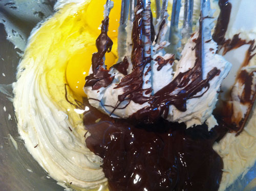 Eggs and melted chocolate added to the butter mixture.