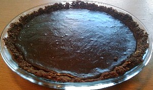 Fudge pie with chocolate graham cracker crust.