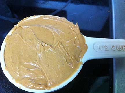 Half cup of peanut butter for the candy recipe.