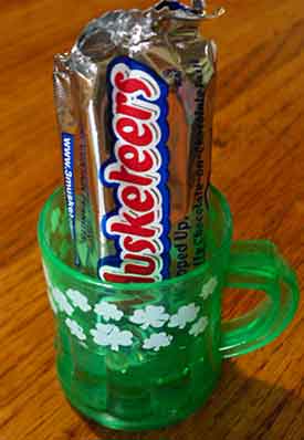 Miniature Musketeers bar in a St. Patrick's Day shot glass