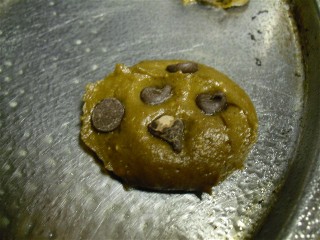 Pumpkin cookie batter with added chocolate chips ready for the oven.