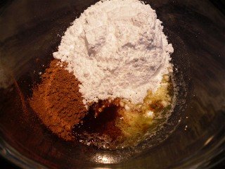 Chocolate glaze ingredients in a bowl.