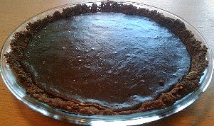 Fudge pie with chocolate graham cracker crust.